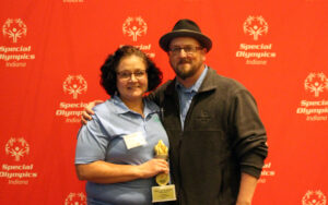 Missee and Joe Foster accept awards as Special Olympics of Indiana 2018 Family of the Year.