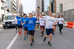 Special Olympics athletes running in a race.