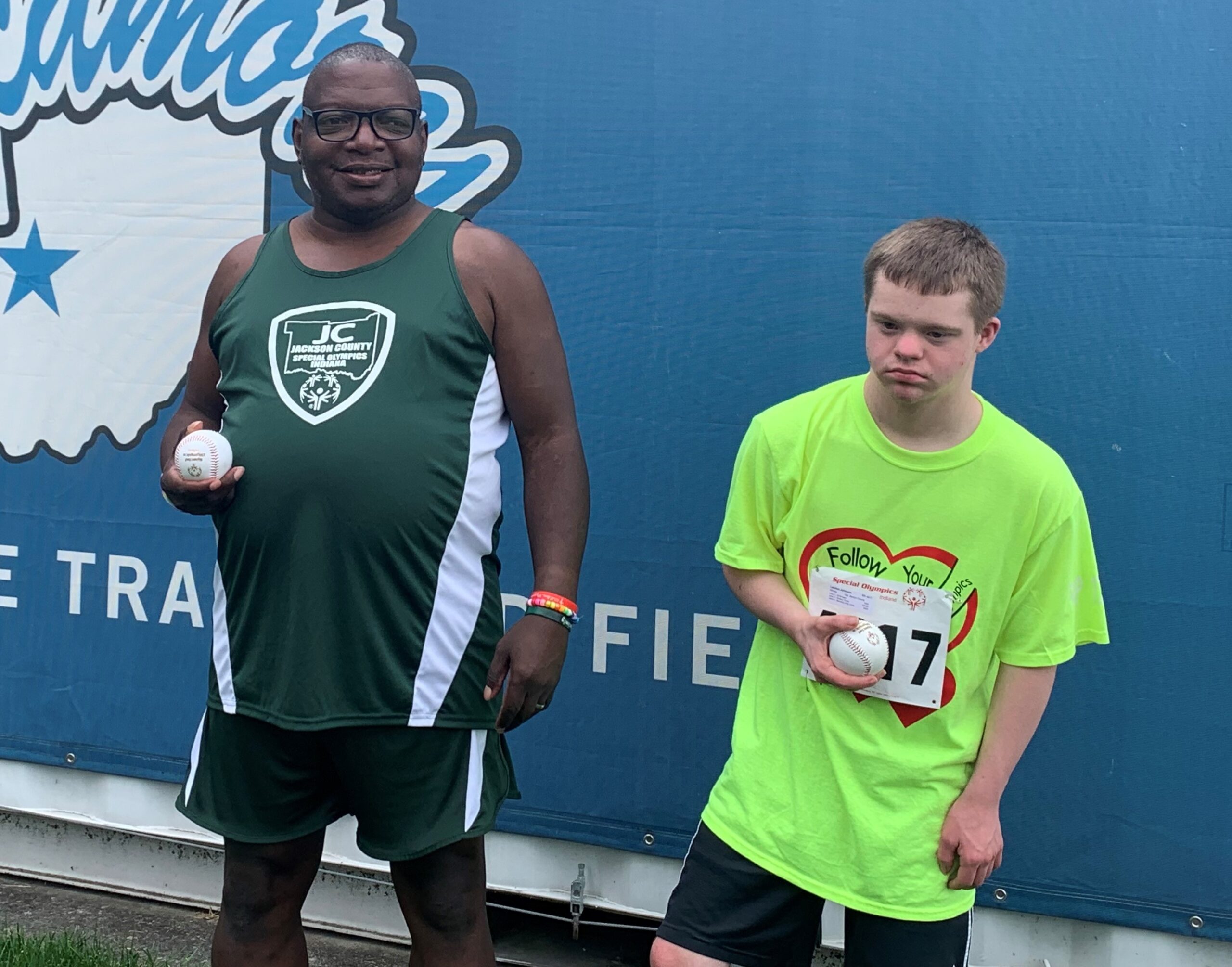 Special Olympics Indiana athlete Landon Johnson and his first pitch partner.