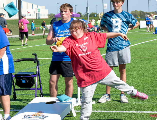 Tossing corn hole